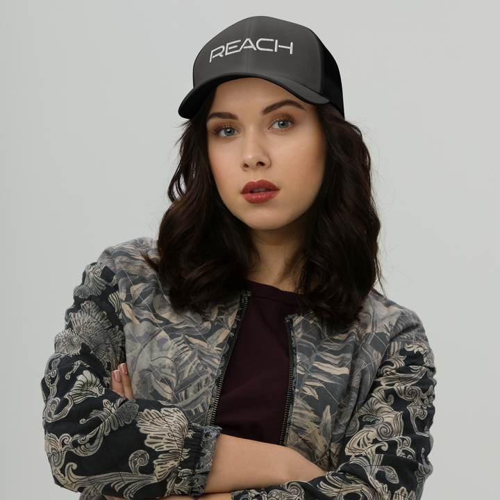 REACH Snapback Trucker Cap